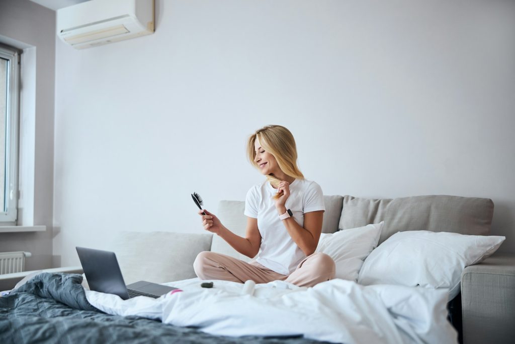 a woman enjoying air conditoning